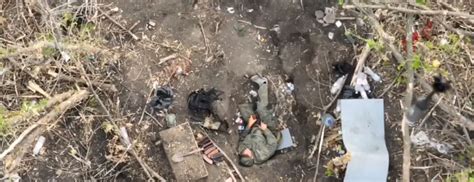 A <b>Ukrainian</b> <b>soldier</b> launches a <b>drone</b> in the area of the heaviest battles with <b>Russian</b> troops in Bakhmut, Donetsk region, <b>Ukraine</b>, Sunday, April 9, 2023 (AP Photo/Libkos). . Ukrainian drone drops bomb on russian soldier